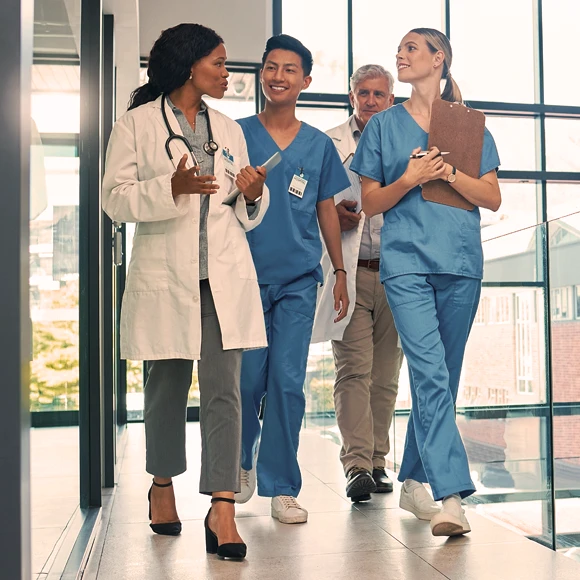 Vituity academic faculty walking with medical residents