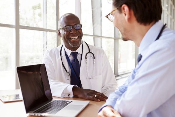 Meeting between a physician and a healthcare executive