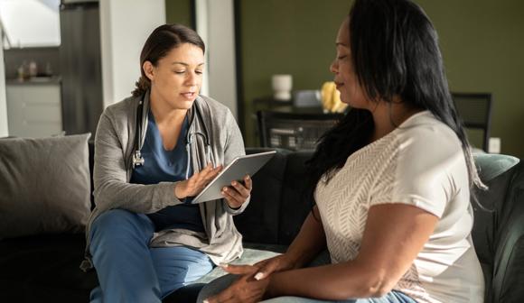 Empath unit image of physician speaking with patient