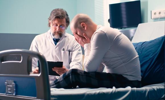 Image of doctor speaking with inpatient psychiatry patient