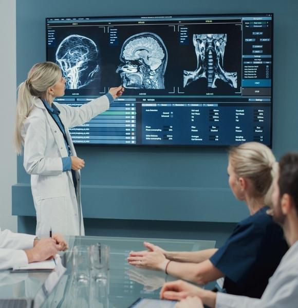 Image of female doctors discussing scan images