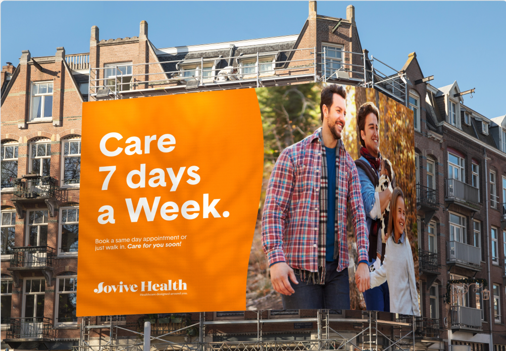 Jovive urgent care advertisement on building that says "care 7 days a week"