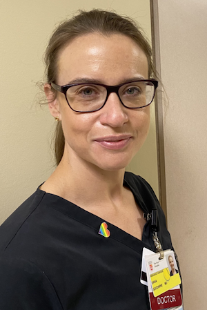 Dr. Diana Goodwine wears a rainbow pin to signal to patients that she is an affirming clinician, and they are safe to be themselves in her care. 