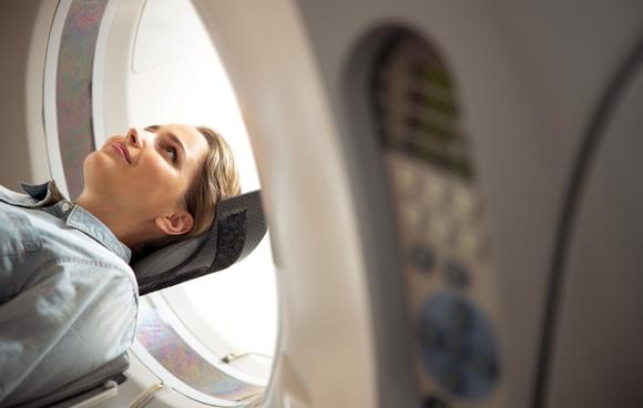 Neurodiagnostic imaging picture of woman patient getting a brain scan