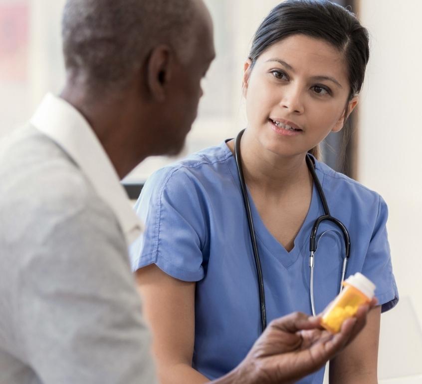 Image of Vituity physician discussing medication with patient
