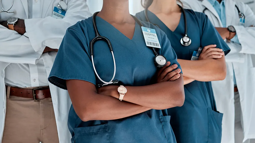 cross section image of medical professionals standing confidently together