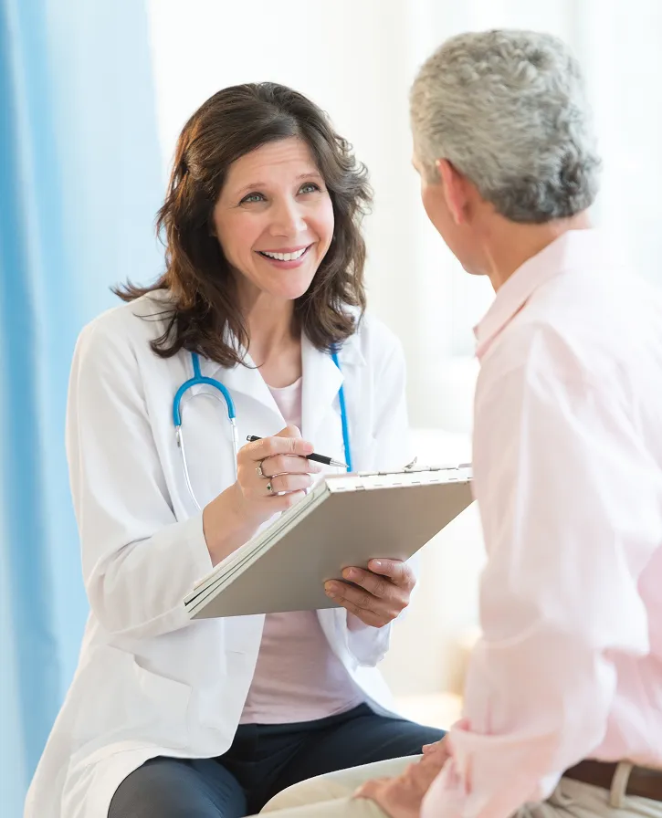 Medical professional discussing with patient